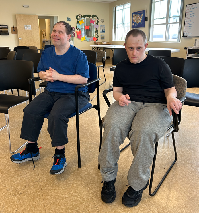 Adam, at right, lives in an apartment in Dartmouth with longtime roommate Michael Wnek, at left. The two, who both have Down syndrome, are cared for all day, every day, by three shifts of residential and community staff provided by the Southeastern Massachusetts Educational Collaborative.